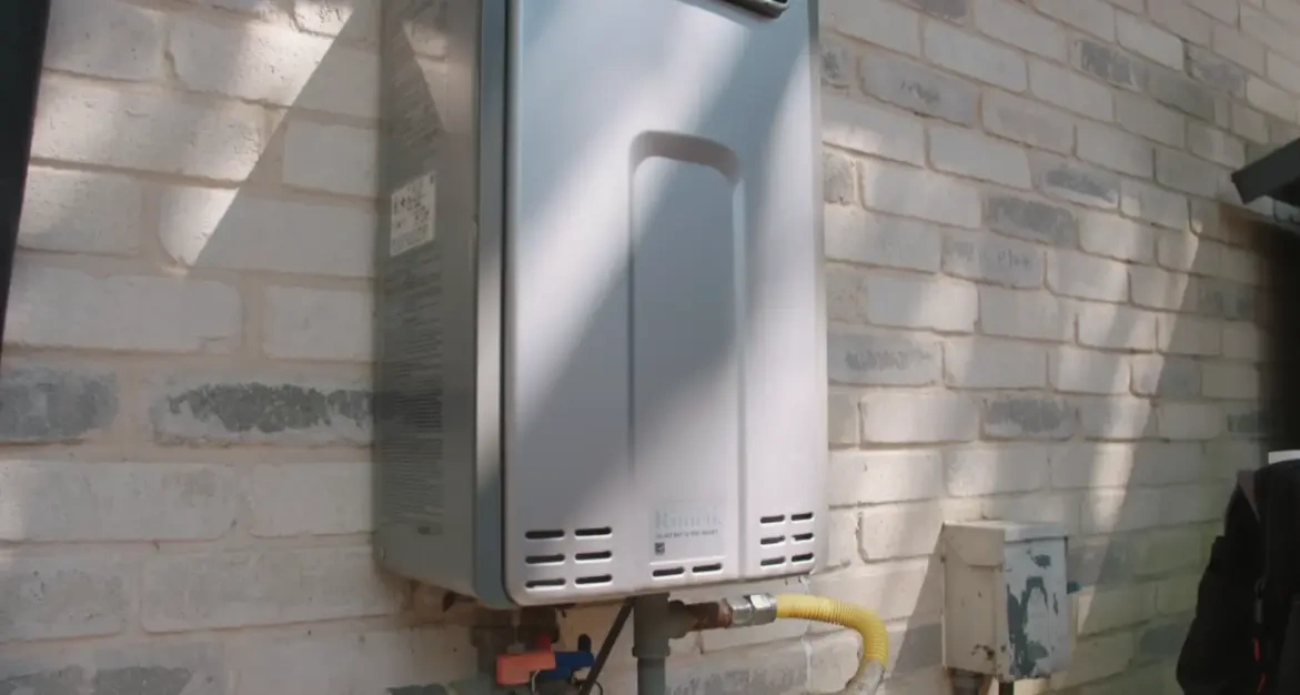 California Tankless technician installing tankless water heater Tustin CA